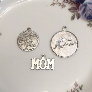 3 silver Mother charms